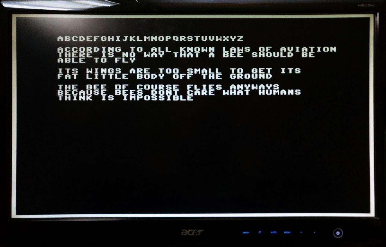 The script to the intro of the bee movie shown in block letters on a monitor connected to the Upduino